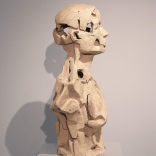 Profile view of clay sculpture, with carvings and hollow areas, by Greek contemporary artist Eleni Kolaitou of the Greek art gallery Asimis, in Santorini