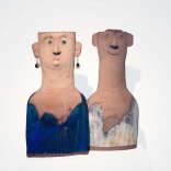 Two abstract clay sculptures inspired by ceramic plank- shaped human figures of the archaic era with contrasting blue and white colours, made by Greek contemporary artist, Eleni Kolaitou