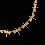 Necklace made of gold dragonflies, made by Greek contemporary artist Eleni Kolaitou of the Greek art gallery, AK in Santorini